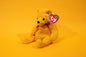 Poopsie (Bear) - TY Beanie Babies - Tag in Protector - Excellent Condition